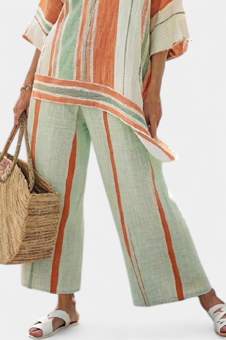 Elisabetta – elegant asymmetric top and wide-leg pants
